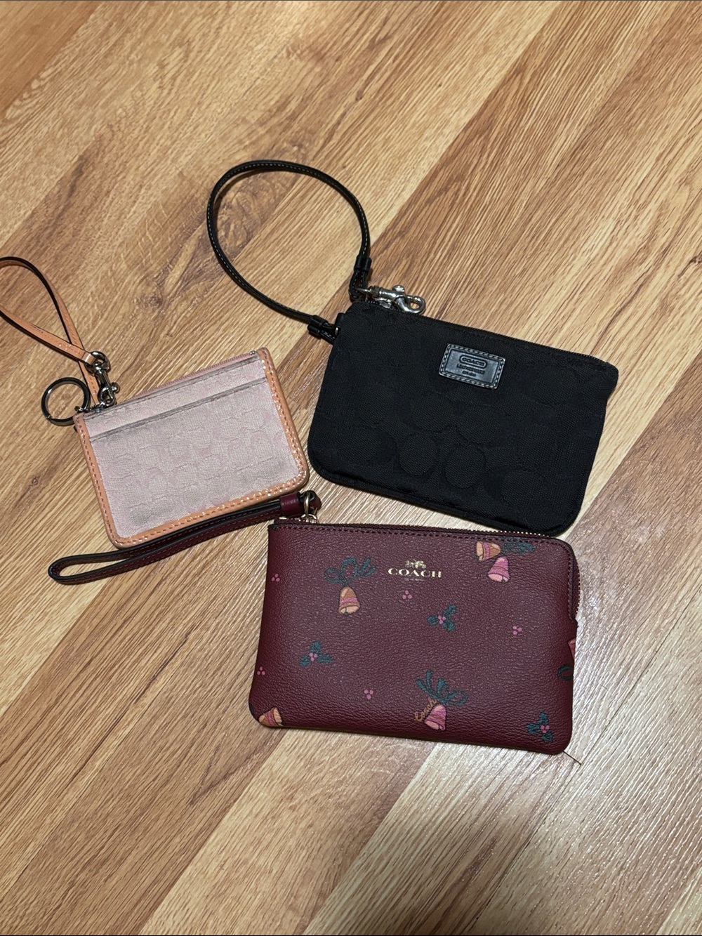 Three Used Coach wristlets